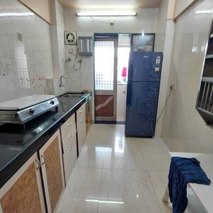 Kitchen in 1 BHK Apartment at Satellite Garden, Goregaon East – for Rent