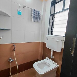 Bathroom in 1 BHK Apartment at Satellite Garden, Goregaon East – for Rent