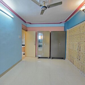 Bedroom in 1 BHK Apartment at Satellite Garden, Goregaon East – for Rent