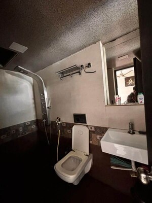 Bathroom in 2 BHK Apartment at Maharaja Retreat CHS, Goregaon East – for Rent