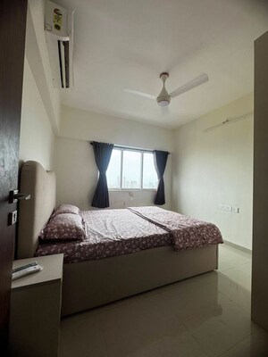 Bedroom in 2 BHK Apartment at Omkar Signet, Malad East – for Rent