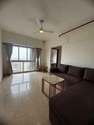 Living Room in 2 BHK Apartment at Omkar Signet, Malad East – for Rent