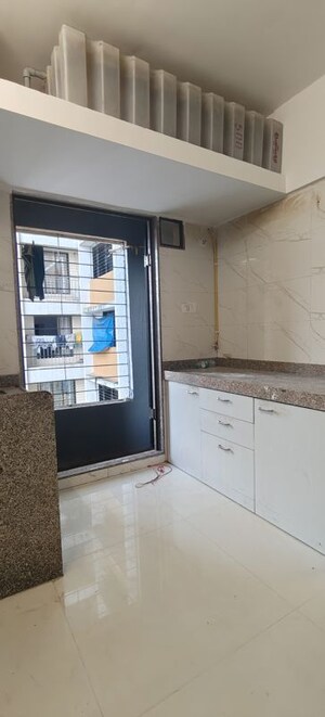 Kitchen in 2 BHK Apartment at Vinay Nagar – for Sale