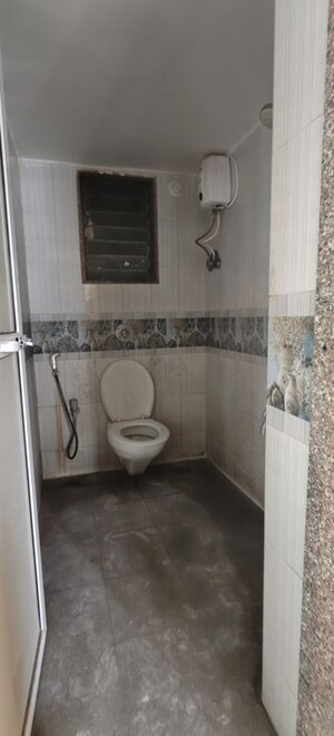 Bathroom in 2 BHK Apartment at Vinay Nagar – for Sale