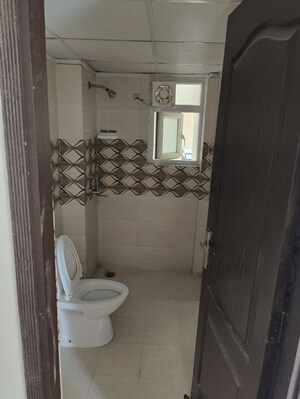 Bathroom in 2.5 BHK Apartment at Amrapali Zodiac, Sector 120 – for Rent
