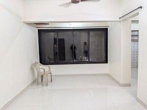 Living Room in 1 BHK Apartment at Sangam Lokmilan CHS, Powai – for Rent