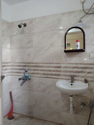Bathroom in 3 BHK Apartment at Hbr Layout – for Sale