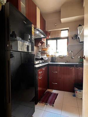 Kitchen in 2 BHK Apartment at Srijan Heritage Enclave Phase I, Rajarhat Road – for Rent