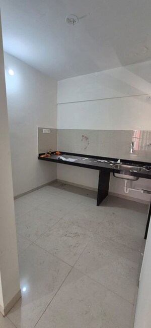 Kitchen in 2 BHK Apartment at Nivasa Enchante, Lohgaon – for Rent