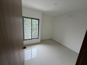 Room in 2 BHK Apartment at Nivasa Enchante, Lohgaon – for Rent
