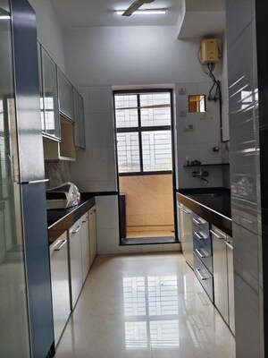 Kitchen in 2 BHK Apartment at K Raheja Heights, Malad East – for Rent