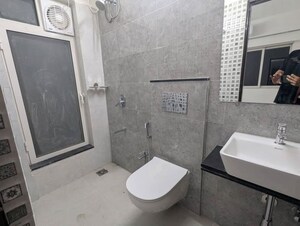 Bathroom in 1 BHK Apartment at Omkar Signet, Malad East – for Rent