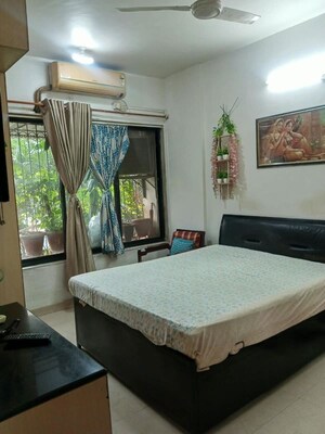 Bedroom in 2 BHK Apartment at Parimal Apartment, Nerul – for Sale