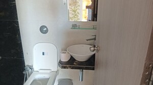 Bathroom in 1 BHK Apartment at Unique Ivana, Mira Road – for Sale