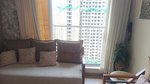 Living Room in 1 BHK Apartment at Unique Ivana, Mira Road – for Sale