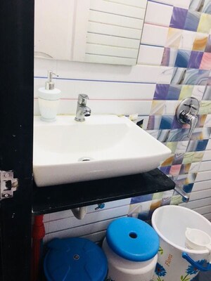Bathroom in 1 BHK Apartment at Lokhandwala Complex – for Rent
