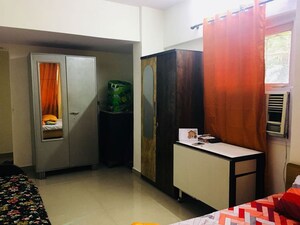 Bedroom in 1 BHK Apartment at Lokhandwala Complex – for Rent