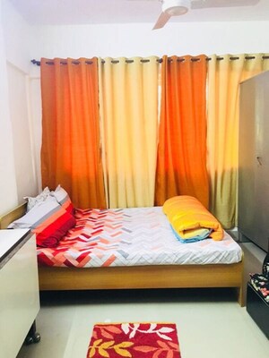 Bedroom in 1 BHK Apartment at Lokhandwala Complex – for Rent