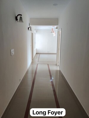 Building Lobby in 3 BHK Apartment at Orchid Petals, Sector 49 – for Rent