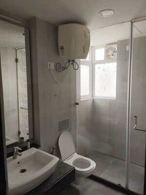 Bathroom in 3.5 BHK Apartment at Microtek Greenburg, Sector 86 – for Rent