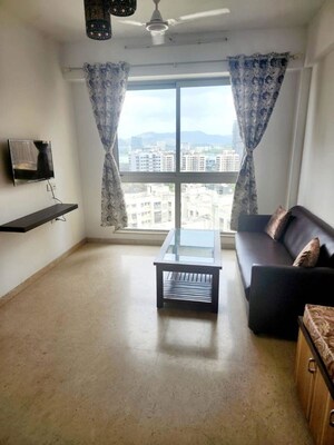 Living Room in 1 BHK Apartment at Hiranandani Zen Maple, Powai – for Rent
