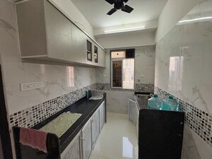Kitchen in 3 BHK Apartment at DGS Sheetal Tapovan, Malad East – for Sale