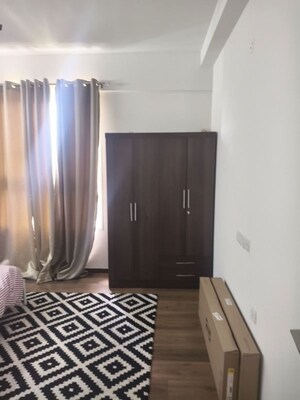 Living Room in 3 BHK Apartment at Godrej Aqua, International Airport Road – for Rent