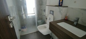 Bathroom in 1 BHK Apartment at Piramal Revanta, Mulund West – for Rent