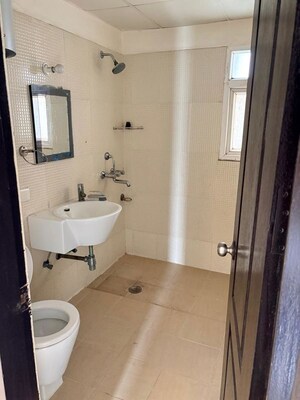 Bathroom in 4 BHK Apartment at Elite Golf Green, Sector 79 – for Rent