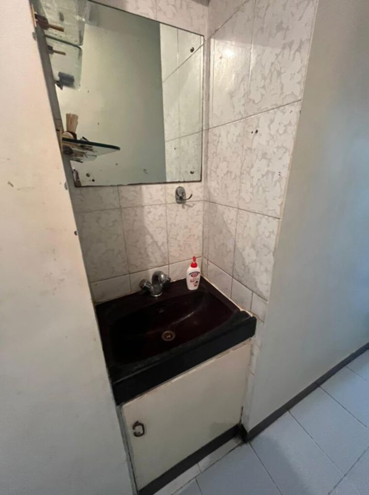 Bathroom, tejashree-chs-bhusari-colony 2 Bedroom 1010 Sq.Ft. Apartment In Bhusari Colony Pune 10681714