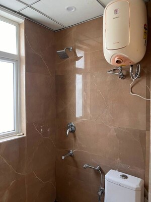 Bathroom in 3.5 BHK Builder Floor at Smart World Gems, Sector 89 – for Rent
