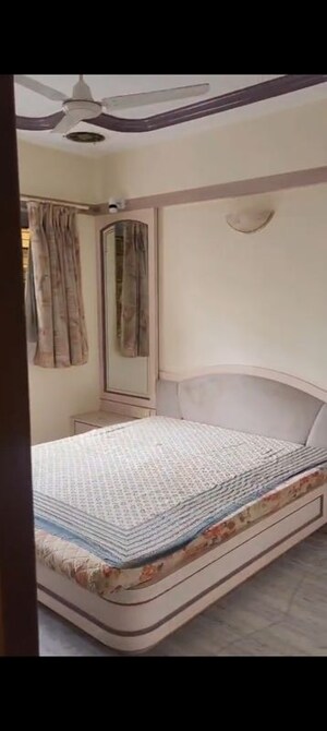 Bedroom in 2 BHK Apartment at Shatrunjay Towers, Dadar East – for Rent