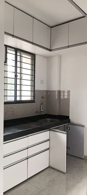 Kitchen in 1 BHK Apartment at Zen Elite, Kharadi – for Rent
