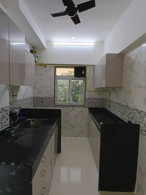 Kitchen in 1 BHK Apartment at DGS Sheetal Tapovan, Malad East – for Rent