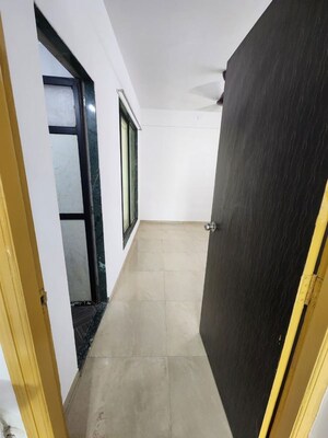 Building Lobby in 2 BHK Apartment at Shreeji Corner, Ulwe – for Rent