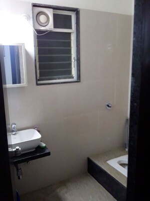 Bathroom in 2 BHK Apartment at Unnati Gagan Cefiro, Undri – for Rent