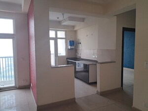 Kitchen in 3.5 BHK Apartment at Amrapali Platinum, Sector 119 – for Sale