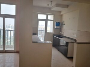 Kitchen in 3.5 BHK Apartment at Amrapali Platinum, Sector 119 – for Sale