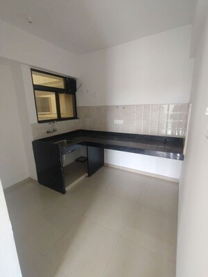 Kitchen in 1.5 BHK Apartment at Goel Ganga Millennia, Undri – for Rent