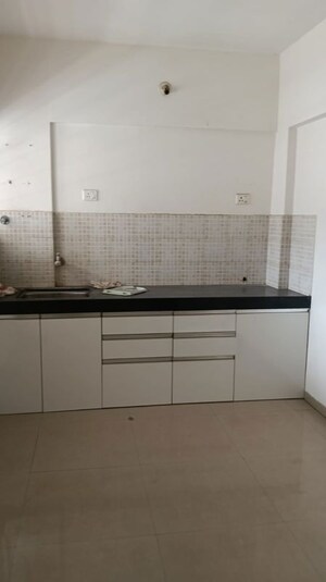 Kitchen in 2 BHK Apartment at Jalan Aura County Pune, Wagholi – for Sale
