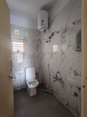 Bathroom in 3 BHK Builder Floor at Vandana Alpyne, Hsr Layout – for Rent