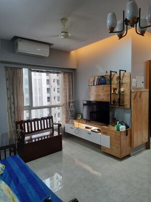 Living Room in 1 BHK Apartment at Lodha Amara, Kolshet Road – for Sale