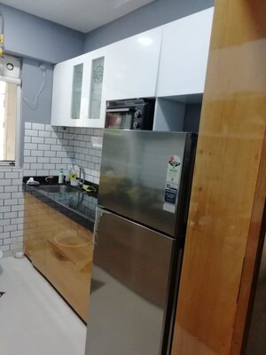 Kitchen in 1 BHK Apartment at Lodha Amara, Kolshet Road – for Sale