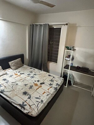 Bedroom in 2 BHK Apartment at Pushpganga Swapnaganga, Pisoli – for Rent