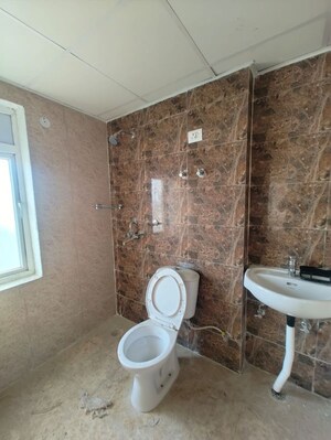 Bathroom in 3 BHK Apartment at Amrapali Dream Valley – for Rent
