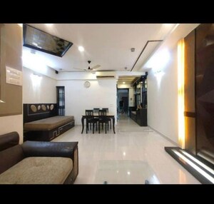 Living Room in 2 BHK Apartment at The Wadhwa Palm Beach Residency, Nerul Sector 4 – for Rent