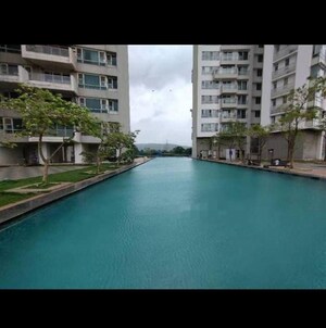 Swimming Pool in 2 BHK Apartment at The Wadhwa Palm Beach Residency, Nerul Sector 4 – for Rent