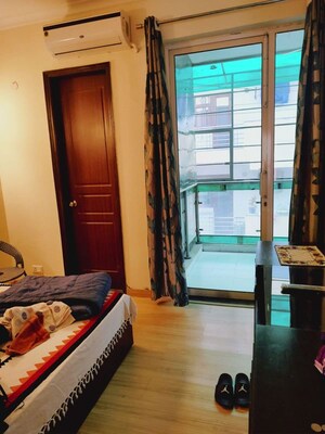 Bedroom in 4 BHK Builder Floor at Ansal API Esencia, Sector 67 – for Rent