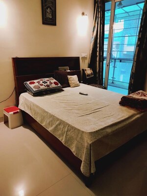 Bedroom in 4 BHK Builder Floor at Ansal API Esencia, Sector 67 – for Rent