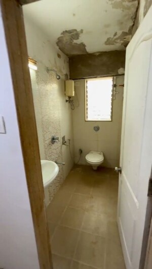 Bathroom in 3 BHK Apartment at Shri Arham Bluz, Andheri West – for Rent